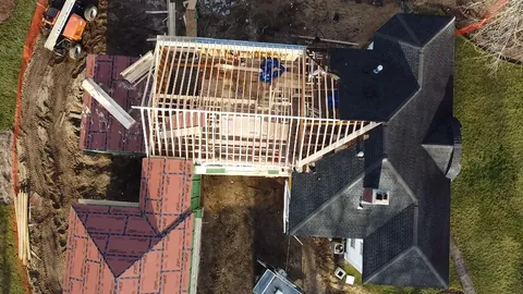 Aerial view of a second-floor addition framed on an existing house